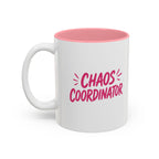 White coffee mug with pink interior featuring bold pink Chaos Coordinator text design
