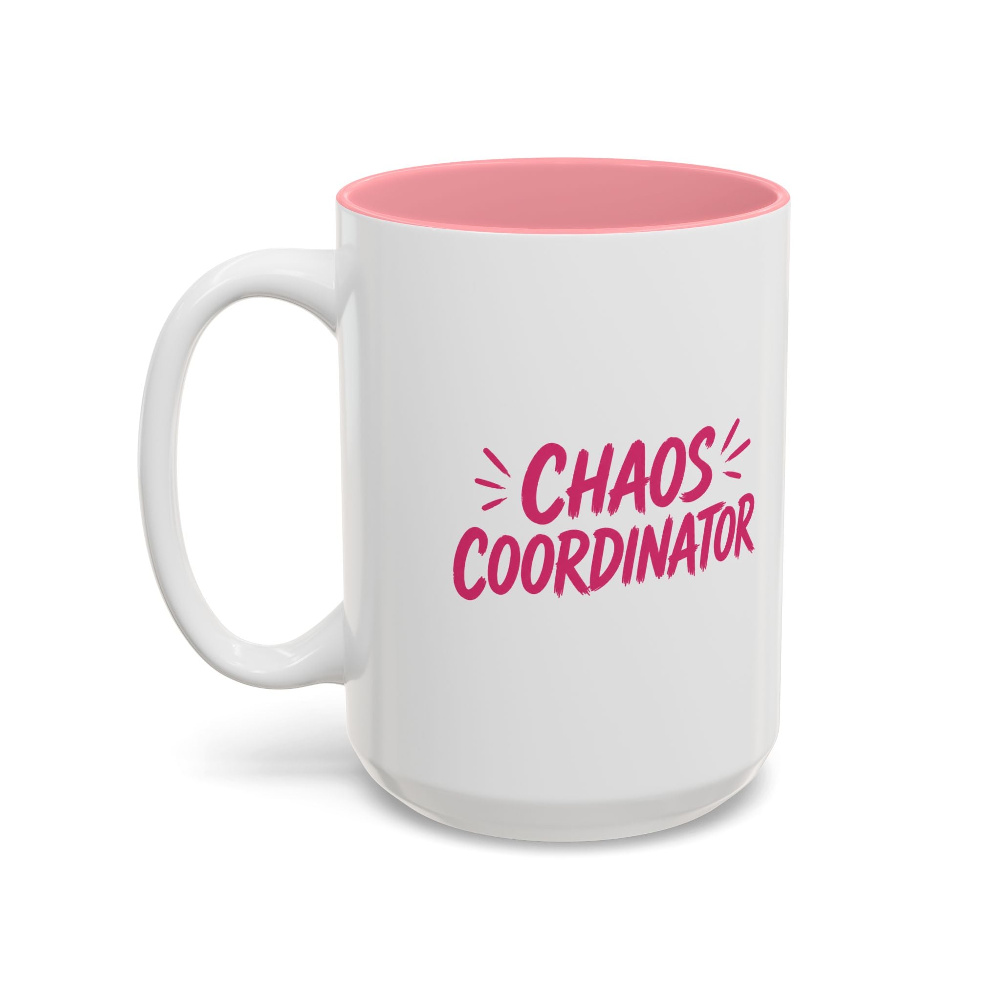White coffee mug with pink interior featuring bold pink Chaos Coordinator text design
