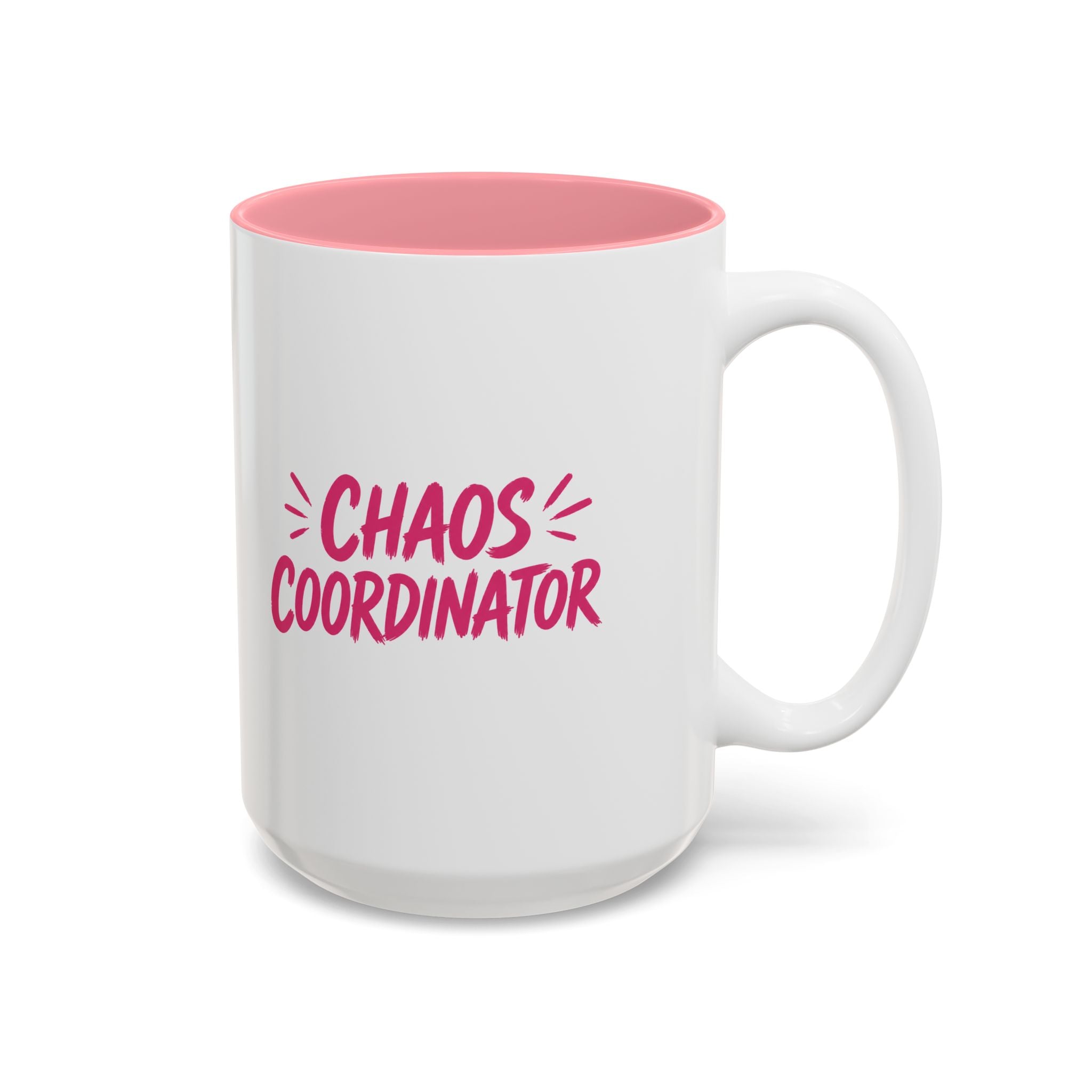 White coffee mug with pink interior featuring bold pink Chaos Coordinator text design