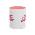 White coffee mug with pink interior featuring bold pink Chaos Coordinator text design